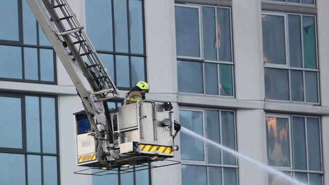 Firefighters at the scene of a factory fire in South Melbourne in May. Picture: David Crosling