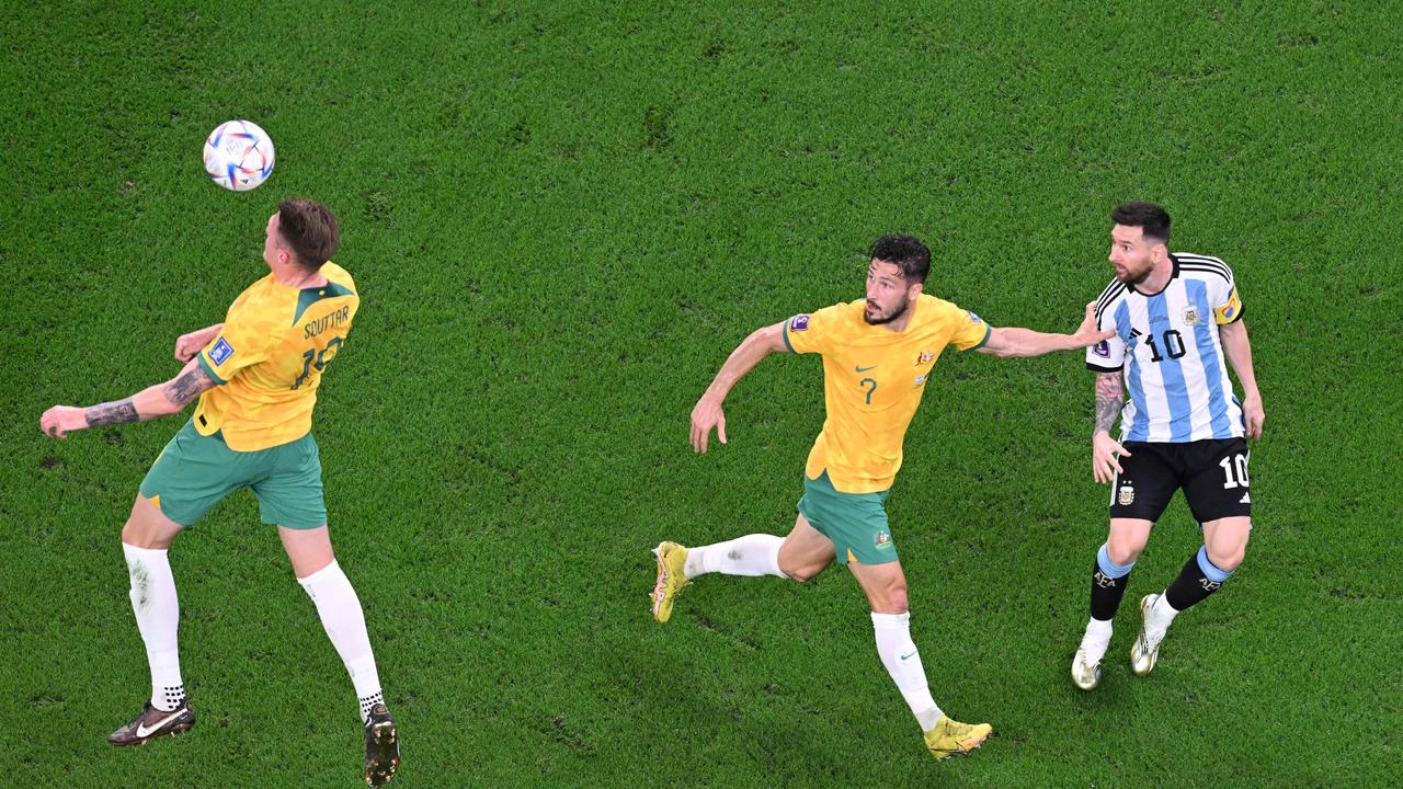 Harry Souttar heads the ball during the Qatar 2022 World Cup round of 16 football match between Argentina and Australia