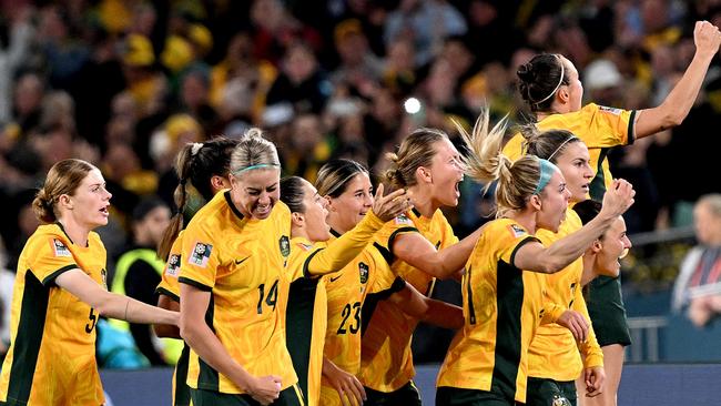 SYDNEY, AUSTRALIA - JULY 20: Steph Catley of the Matildas celebrates with team mates after scoring a goal during the FIFA Women's World Cup Australia & New Zealand 2023 Group B match between Australia and Ireland at Stadium Australia on July 20, 2023 in Sydney, Australia. (Photo by Bradley Kanaris/Getty Images)