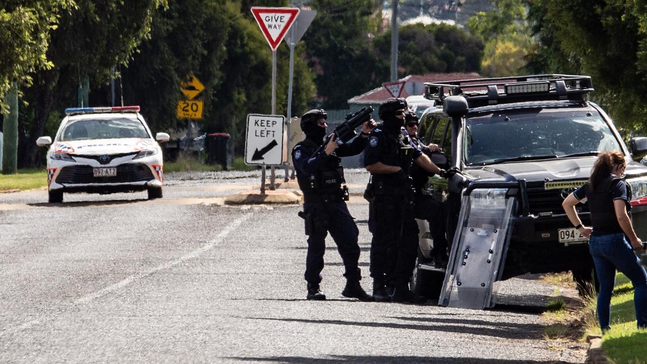 Police at the scene of a siege with an armed man in Doonkuna St, Kingaroy. March 21, 2022. Picture: Dominic Elsome