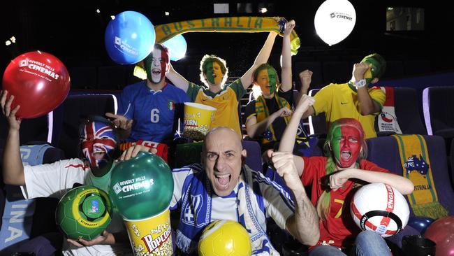 Beverly Hills Cinema general manager Costas Meligonis, centre, with staff ahead of a screening of the 2014 FIFA World Cup games. Picture: Craig Wilson