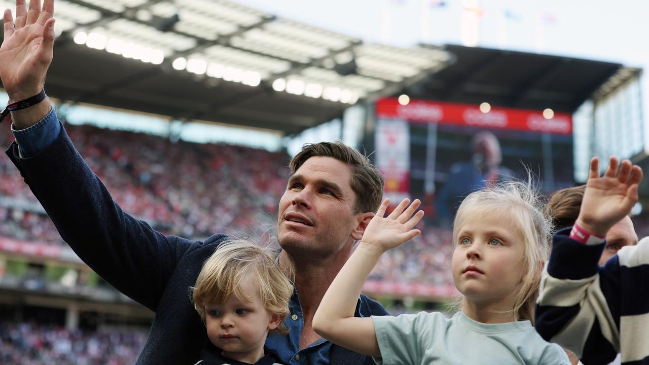 Tom Hawkins waves to the crowd on AFL grand final day. Picture Lachie Millard