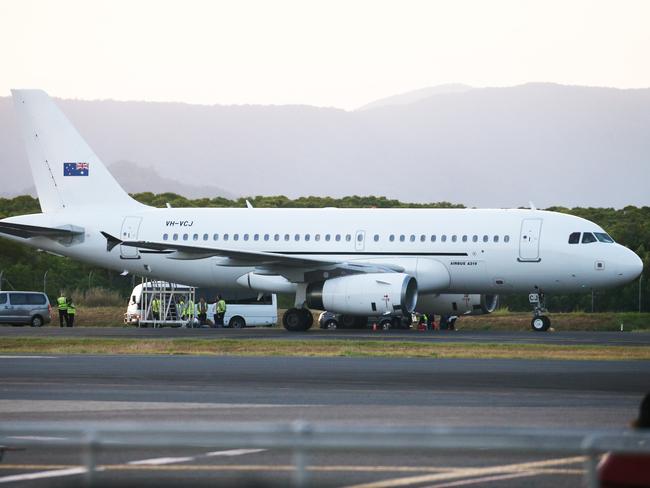 A group of asylum seekers boarded a plane bound for a Darwin detention centre where they will be sent back to Vietnam. Picture: Brendan Radke