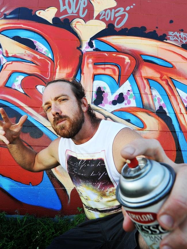 Hip hop singer and street artist Garth Jankovic has painted more than 1000 murals over the world and was one of the first street artists in Townsville. Photo: Fiona Harding