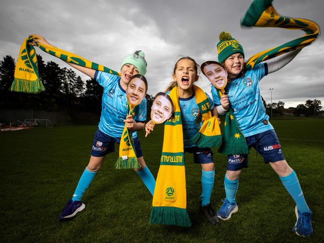 Matildas fans Amelia, 11, Isabella, 8, Chloe, 8. Picture: Mark Stewart