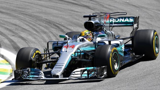 Mercedes' British driver Lewis Hamilton powers his car during the Brazilian Formula One Grand Prix, at the Interlagos circuit in Sao Paulo, Brazil, on November 12, 2017. / AFP PHOTO / EVARISTO SA