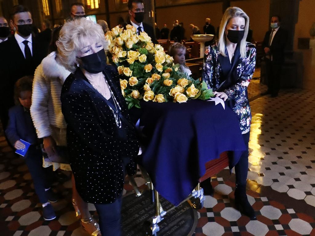 Newton’s wife Patti was by his side the whole way as the casket was carried into the hearse. Picture:Darrian Traynor/Getty Images