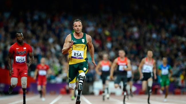 Pistorius competing at the London 2012 Paralympic Games. (Photo by Adrian DENNIS / AFP)