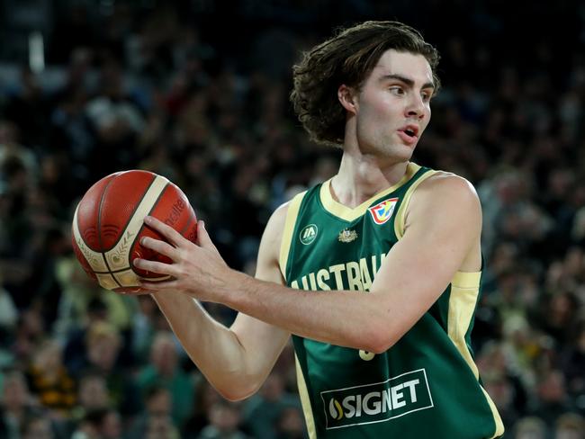 Josh Giddey looks to pass during the match between Australia Boomers and Venezuela at Rod Laver Arena in August. Photo: Kelly Defina/Getty Images.