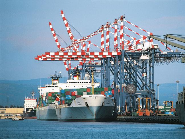 Container ships pictured in the port of Gioia Tauro in Calabria, Italy. The police officer responsible for overseeing the site has been arrested for alleged ties to Mafia operations.