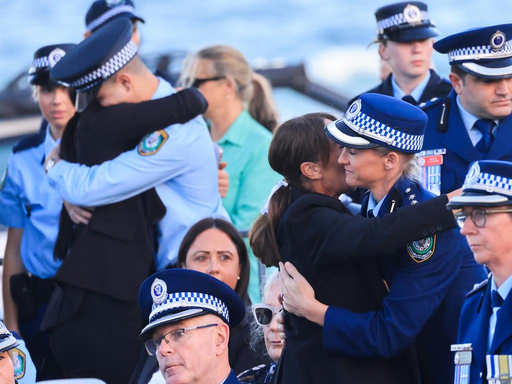 Police officer Amy Scott is embraced during a candlelight vigil at Bondi Beach, held to honour the victims of the tragic stabbing attack at Westfield Bondi Junction. The attack, which occurred on April 13, claimed the lives of seven people, including the offender. The community gathered to remember the victims in the wake of the horrific incident, which had deeply affected Sydney’s Eastern suburbs. Picture: Getty