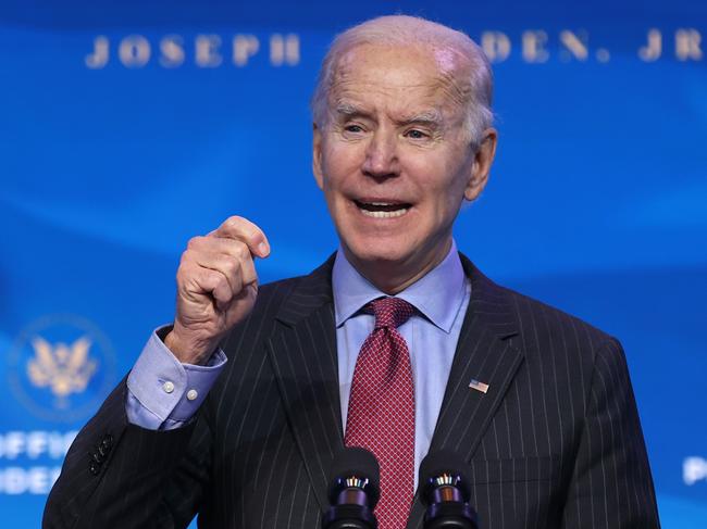 WILMINGTON, DELAWARE - JANUARY 08: U.S. President-elect Joe Biden delivers remarks after he announced cabinet nominees that will round out his economic team, including secretaries of commerce and labor, at The Queen theater on January 08, 2021 in Wilmington, Delaware. Biden announced he is nominating Rhode Island Gov. Gina Raimondo as his commerce secretary, Boston Mayor Martin J. Walsh his labor secretary and Isabel Guzman, a former Obama administration official, as head of the Small Business Administration.   Chip Somodevilla/Getty Images/AFP == FOR NEWSPAPERS, INTERNET, TELCOS & TELEVISION USE ONLY ==