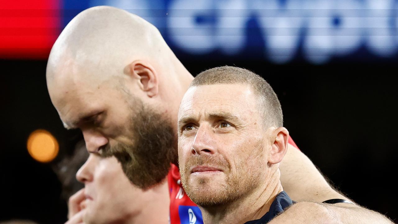 Melbourne coach Simon Goodwin says Max Gawn’s (left) plans to return within a fortnight from a chipped fibula are ‘ambitious’. Picture: Michael Willson / Getty Images