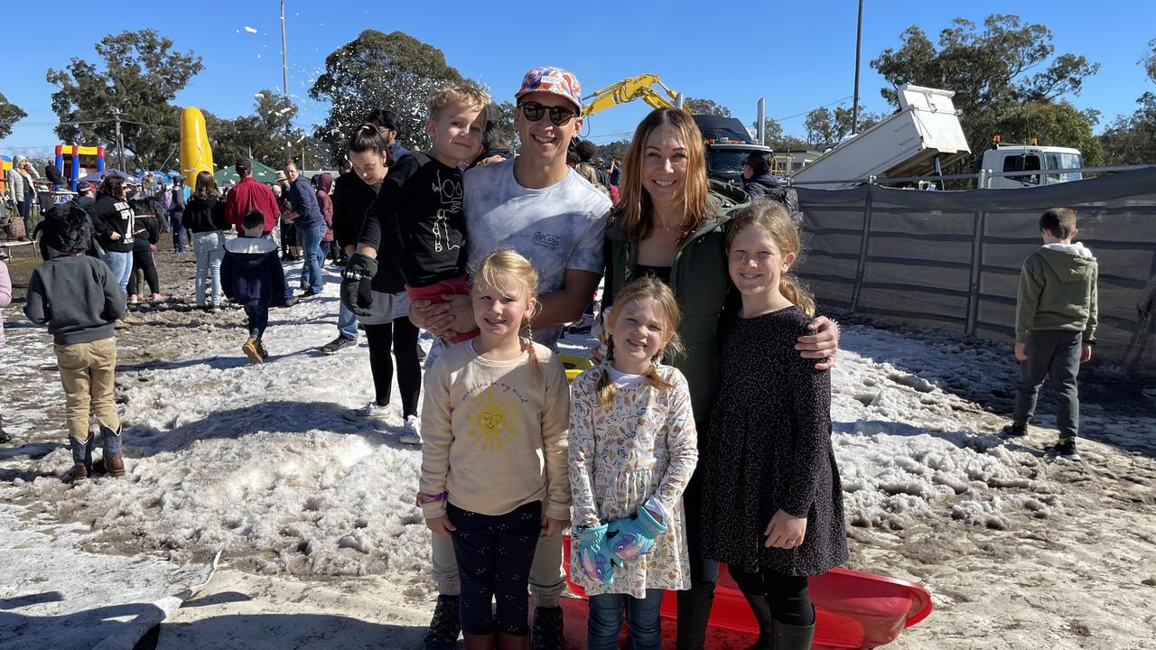 Spence (4) and Dave Chin with Milla (6), Myla (6), Tamara and Evie Russell (9) enjoy the snowfields at Snowflakes in Stanthorpe 2021. Photo: Madison Mifsud-Ure / Stanthorpe Border Post