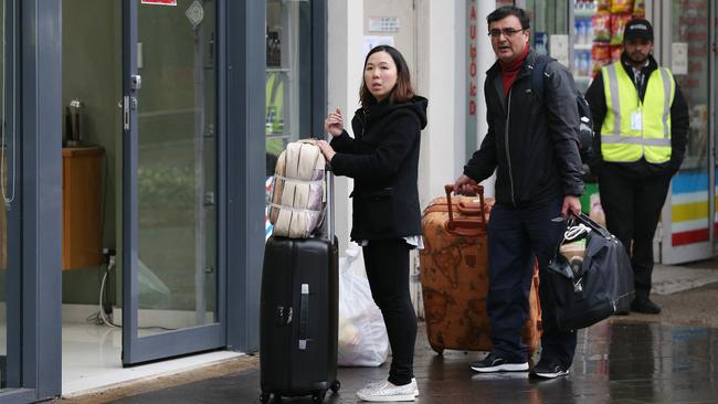 Residents of Mascot Towers wait for access. Picture: David Swift.