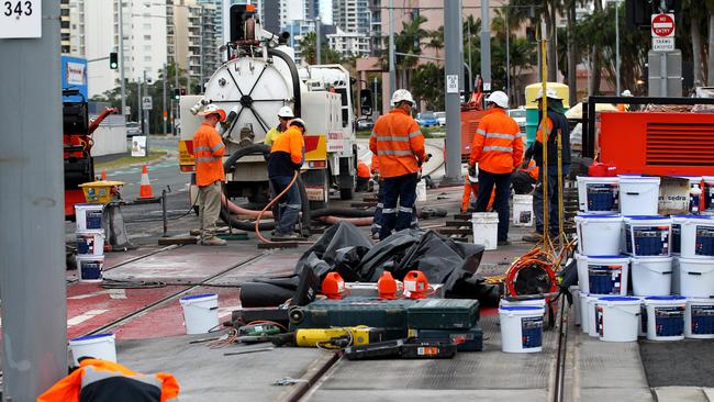 Repairs during the Broadbeach-Surfers section. Picture Mike Batterham.