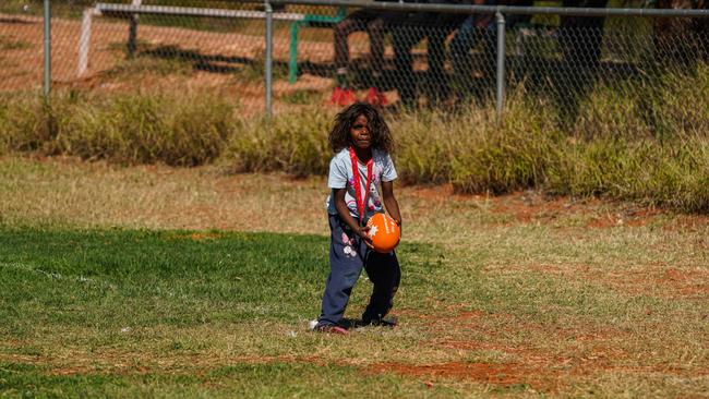 Melbourne Demons players Shane McAdam and Andy Moniz-Wakefield went to Santa Teresa ahead of the 2025 AFL game in Alice Springs. Picture: Melbourne Demons