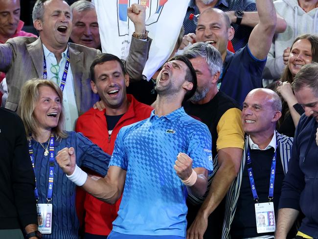 MELBOURNE, AUSTRALIA - JANUARY 29: Novak Djokovic of Serbia celebrates winning championship point with Dijana Djokovic, Goran Ivanisevic and his player box in the MenÃ¢â¬â¢s Singles Final against Stefanos Tsitsipas of Greece during day 14 of the 2023 Australian Open at Melbourne Park on January 29, 2023 in Melbourne, Australia. (Photo by Lintao Zhang/Getty Images)