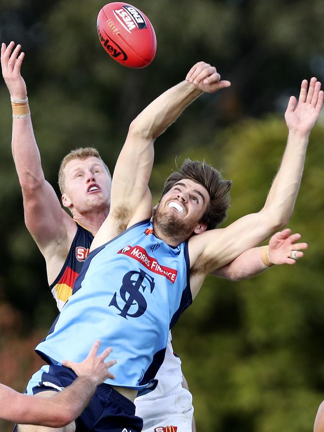 Sturt’s Thomas Read rucks against Adelaide’s Reilly O'Brien in the SANFL. Picture Sarah Reed