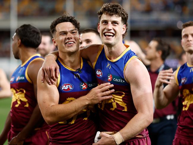 BRISBANE, AUSTRALIA - SEPTEMBER 23: Cam Rayner (left) and Jarrod Berry of the Lions celebrate during the 2023 AFL Second Preliminary Final match between the Brisbane Lions and the Carlton Blues at The Gabba on September 23, 2023 in Brisbane, Australia. (Photo by Michael Willson/AFL Photos via Getty Images)