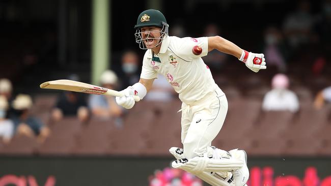 David Warner takes off for a quick single during his short return.