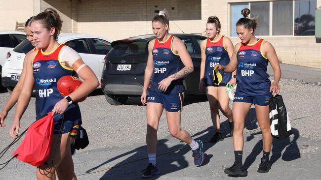 Deni Varnhagen (middle) prepares to hit the training track on Monday. Picture: Dean Martin