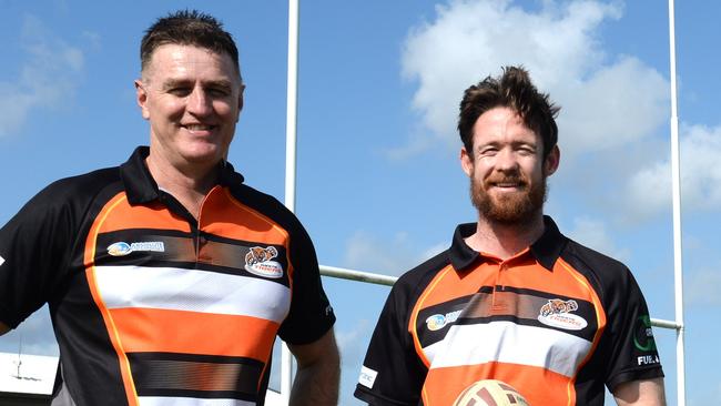 Craig Menkins (left) with West Tigers' signing Sam Clune, who is expected to bring high level experience to the club