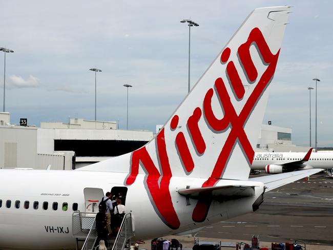 SYDNEY, AUSTRALIA - NewsWire Photos - SEPTEMBER 09, 2022: General generic editorial stock image of Virgin airplane at Sydney Domestic Airport. Picture: NCA NewsWire / Nicholas Eagar