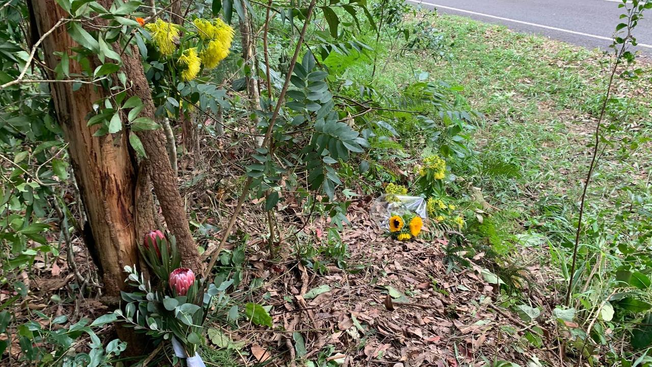 Flowers placed at the scene of a fatal motorcycle crash in Cooroy.