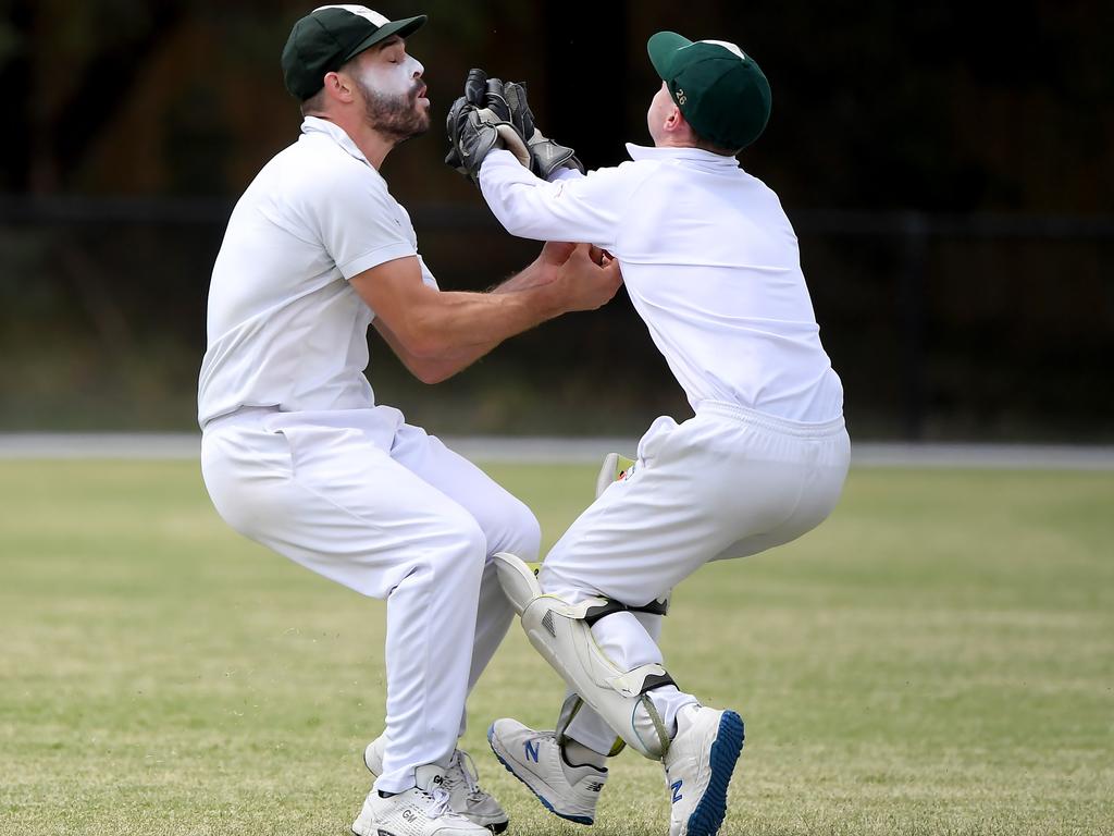 DVCA - Mine or Yours? North Eltham Wanderers pair Adam Tsapatsaris and Jake Hedley collide in the field. Picture: Andy Brownbill