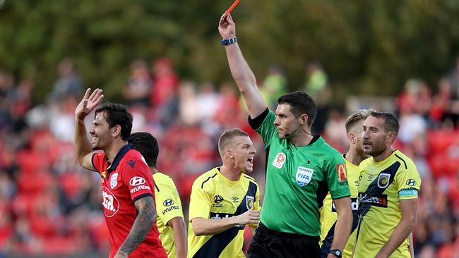 Ersan Gulum of United receives a red card for a tackle on Central Coast’s Trent Buhagiar in Round 20. Picture: AAP Image/James Eslby