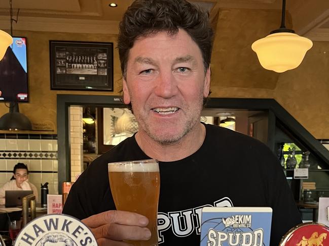 NRL great Mark "Spudd" Carroll with his new brew, "Spuddwiser" Picture: Supplied