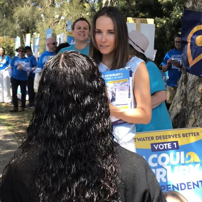 Independent candidate in the Pittwater by-election, Jacqui Scruby, taking with a voter outside the Ted Blackwood Memorial Hall in Warriewood, on Saturday. Picture: Jim O’Rourke