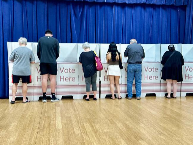 Pre-Polls - Generic polling booth picture. People voting (Southport Community Centre).NO BYLINE