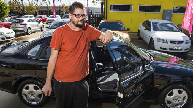 GENEROUS GIFT: With his Cheap Cars Toowoomba donation, a 2001 Holden Astra, is Brendon McGurgan. Picture: Kevin Farmer