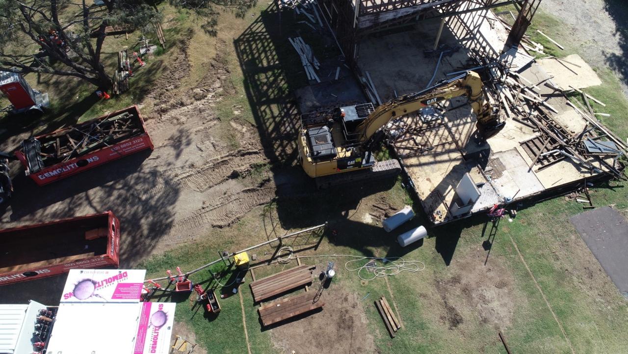 The old Woolgoolga SLSC clubhouse being demolished. February 2021.