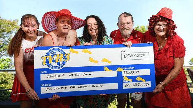 Women's Centre specialist homelessness service team leader Sallie Kearnan (middle), accepts a donation of $1500 from Townsville Hash House Harriers, Evelyn Stent, Bill Stent, Don Brown and Kay Edwards. Picture: Shae Beplate.