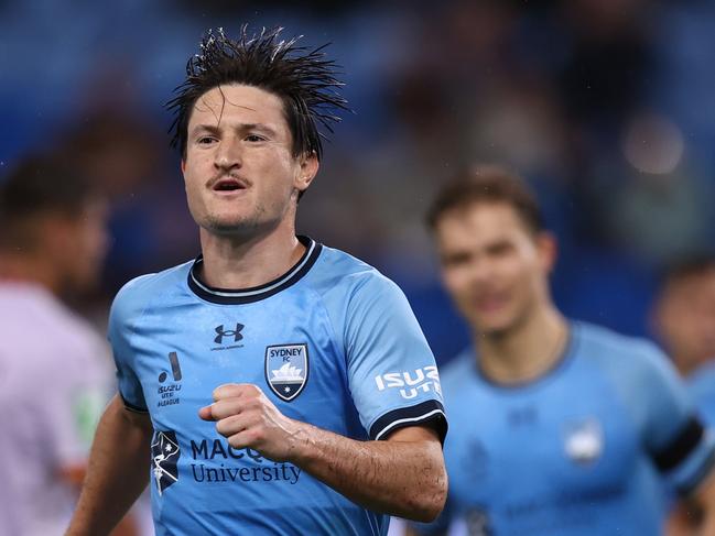 SYDNEY, AUSTRALIA - JANUARY 08: Joe Lolley of Sydney FC celebrates scoring a penalty goal during the round 11 A-League Men match between Sydney FC and Perth Glory at Allianz Stadium, on January 08, 2025, in Sydney, Australia. (Photo by Jason McCawley/Getty Images)