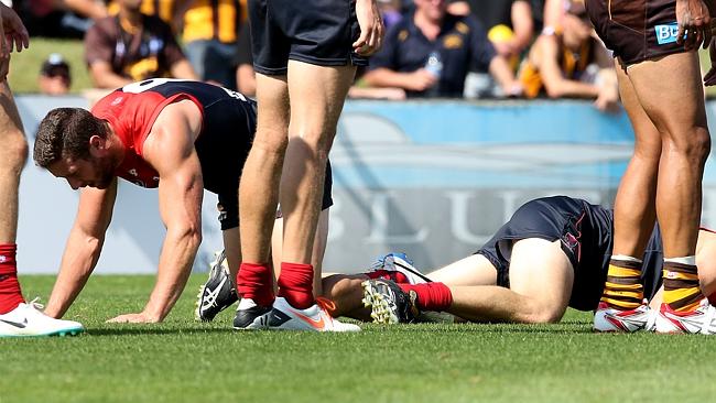 James Frawley and Jack Grimes hurt after a mid-air clash. Picture: Wayne Ludbey 