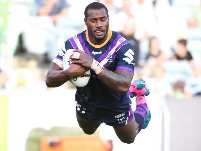 Suliasi Vunivalu launches to score a try for the Storm. PictureL Getty Images