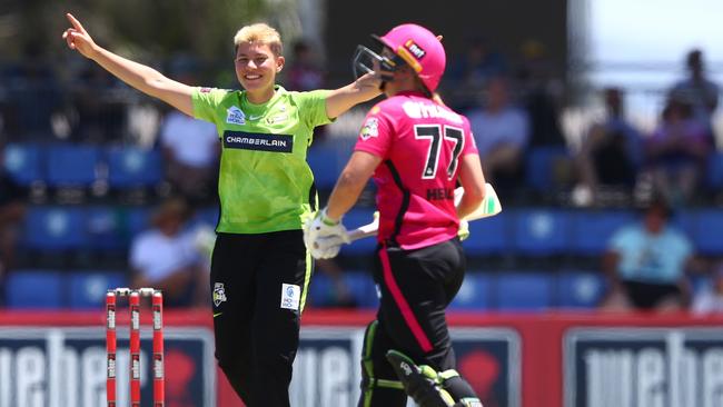 Issy Wong celebrates the early wicket of Alyssa Healy. Picture: Chris Hyde/Getty Images