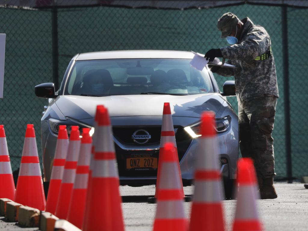 Members of the Army National Guard work at a recently opened coronavirus testing site in the Brooklyn borough of New York City. Picture: Spencer Platt/Getty Images/AFP