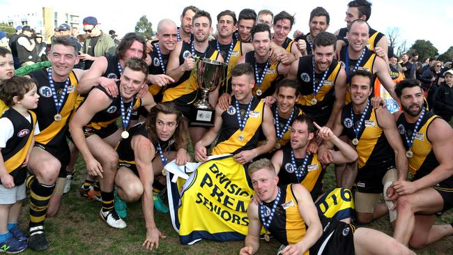 Heidelberg celebrates its 2016 grand final win over Macleod. Picture: Stuart Milligan