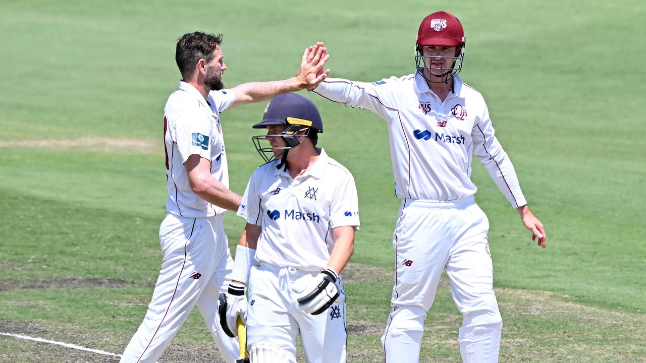 BRISBANE, AUSTRALIA - NOVEMBER 11: Michael Neser of Queensland celebrates with team mates after taking the wicket of Marcus Harris of Victoria during the Sheffield Shield match between Queensland and Victoria at Allan Border Field, on November 11, 2022, in Brisbane, Australia. (Photo by Bradley Kanaris/Getty Images)