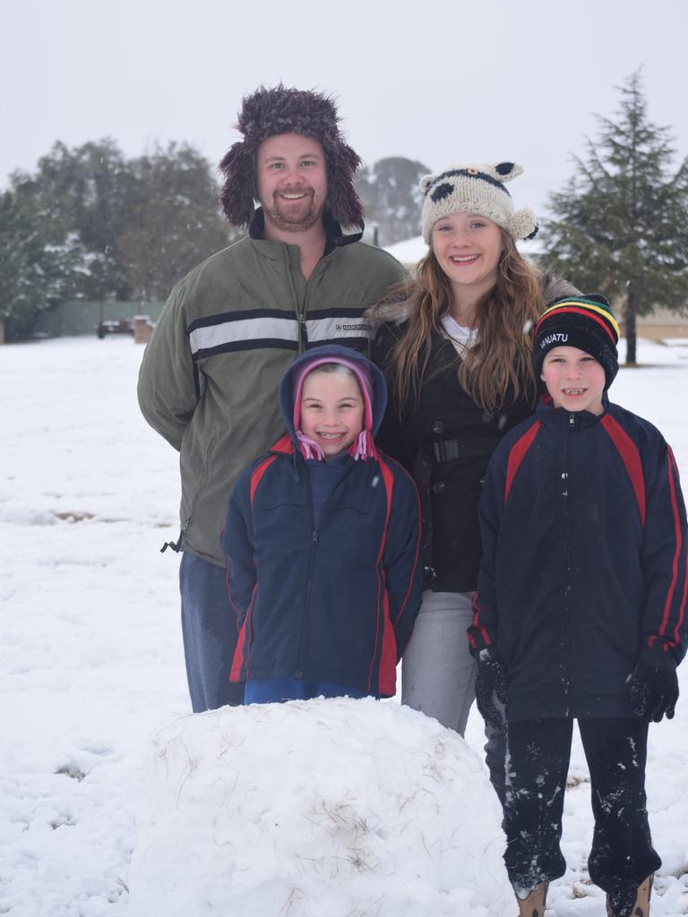 Warwick's Josh and Mya Pitts with Lilly and Alex Self playing in the snow at Wallangarra on in a “once in a lifetime” opportunity. Photo: Alex Nolan / Stanthorpe Border Post