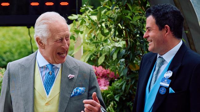 King Charles III (left) speaks with Asfoora’s trainer Henry Dwyer at Royal Ascot. Picture: Benjamin Cremel / AFP via Getty