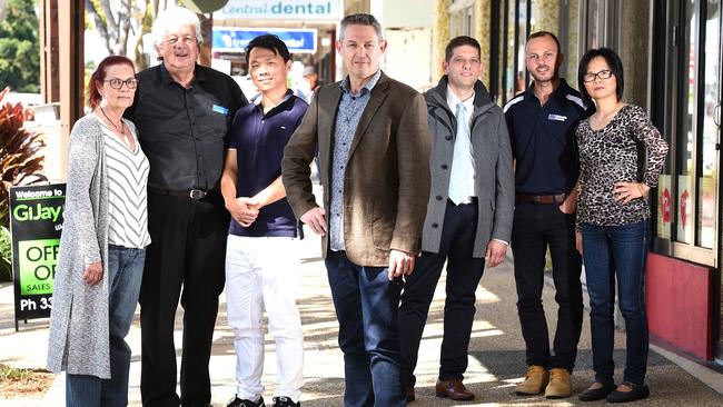 Rosa Constable, Michael Sunderland, John Gu, Mark Williams, Angelo Karalis, Adam Toth, Lily Zheng pose for a photograph at Mt Gravatt Central. Picture: AAP/John Gass