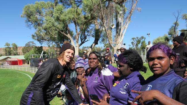 Fremantle's Nat Fyfe with some Red Centre Dockers fans.