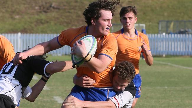 Ashgrove. Marists Campbell Moller looks to pass. (AAP Image/Richard Waugh)