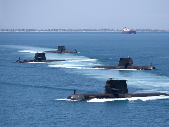 Collins Class submarines HMAS Collins, HMAS Farncomb, HMAS Dechaineux and HMAS Sheean in formation while transiting through Cockburn Sound, Western Australia. Collins Class submarines are an essential part of Australia’s naval capability, providing a strategic advantage in terms of surveillance and protection of our maritime approaches. *** Local Caption *** Royal Australian Navy Collins Class Submarines, HMAS Collins, HMAS Farncomb, HMAS Dechaineux and HMAS Sheean sail in formation while transiting through Cockburn Sound, Western Australia, in February 2019. Picture: Royal Australian Navy